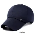 Detailed close-up of dark blue canvas baseball cap featuring silver shield metal logo - M (56-58cm) / Blue (Metal Badge)