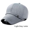 Close-up of light gray baseball cap featuring fine twill texture and shield metal logo - M (56-58cm) / Light Gray (Metal Badge)
