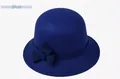 Détail du chapeau cloche élégant en feutre de laine bleu avec décoration de nœud - M / Bleu