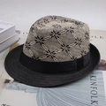 Détail du chapeau de paille Panama avec ruban noir et motif de tissage en flocons - Taille Unique 58cm / Fleur à Quatre Feuilles Noir