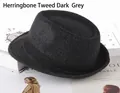 Detailed view of dark grey herringbone wool fedora with black ribbon on books - One Size 58cm / Herringbone Deep Grey
