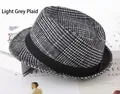 Close-up of light grey plaid fedora hat with black ribbon on minimalist book stack - One Size 58cm / Light Grey Large Plaid
