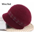 Detail of wine red knit beanie with fluffy texture and shimmering silver accents - Houndstooth Wine Red