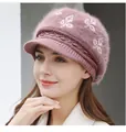 Close-up of thick knitted winter hat showing fuzzy texture and white leaf patterns - Khaki (Leaf Flower)
