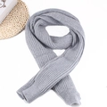 Detailed view of gray ribbed knit scarf with thick textured weave on a white background - Basic Versatile Knit Scarf / Gray (Wool Knit)