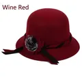 Wine red wool cloche hat for women featuring a floral ornament and faux fur ball - 57cm / Burgundy