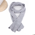 Detail of grey knitted scarf showing wavy edge texture and soft wool material - Wave Finish Chenille Knit Scarf / Grey (Chenille)
