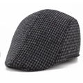 Detail shot of the classic houndstooth pattern and tweed texture on this men's flat cap - One Size 57-58cm / Dark Grey Houndstooth