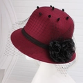Detail of burgundy wool fedora with black mesh veil, polka dots and large side flower decoration - One Size / Wine Red With Mesh Flower