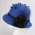 Detail view of royal blue wool cloche hat featuring black mesh veil and floral ornament - One Size / Royal Blue With Mesh Flower