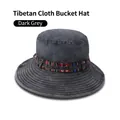 Detail of dark gray washed canvas bucket hat featuring ethnic pattern embroidery band - One Size 58cm / Dark Grey (Tribal Band)