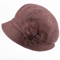 Detail view of the floral embroidery and brown fur ball on the warm wool winter hat - Adjustable 57-59cm / Khaki