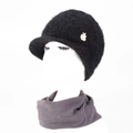 Detail of black winter knit hat with plush visor and matching neck warmer on model - Hat And Neck Warmer / Black
