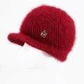Detailed view of dark red plush knit hat with brim and golden apple metal buckle - Purplish Red