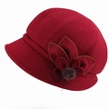 Detail view of burgundy cloche hat with fabric flower and fur pompom accent - Adjustable 57-59cm / Red