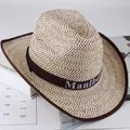 Detail of straw cowboy hat with dark brown trim and mesh texture for sun protection - One Size 58cm / Coffee Edge