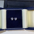 Elegant heart-cut moissanite stud earrings in silver settings on a blue velvet box - Heart Shaped Rhinestone Style (ED113) / 925 Silver