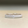 Macro shot of 925 sterling silver brushed ring with three small inlaid crystals - US 5 / Narrow Version / Silver