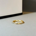 Minimalist gold-plated Mobius ring with brushed texture and sparkling diamond accents - US 5 / Gold