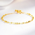 Elegant gold S925 sterling silver beaded bracelet with cross charms on white background - 925 Silver / Gold-Tone
