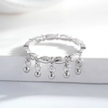 Detail of silver wavy band ring with five delicate hanging metallic ball charms - US 5 / Silver (CBJZ555)
