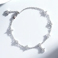 Détail du bracelet en argent sterling S925 avec charms étoiles et zircons scintillants - Argenté