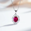 Macro shot of S925 silver flower pendant with oval ruby gemstone and brilliant white zircons - With Chain / Red Corundum (XL120)