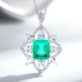 Macro shot of silver Halo emerald cut green gemstone pendant with zircon accents - 925 Sterling Silver Cable Chain Set / Paraiba Blue (XL107)