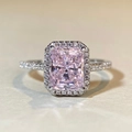 Elegante S925 zilveren ring met roze radiant geslepen diamant en halo op textuurachtergrond - US 5 / Roze