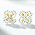 Dettaglio degli orecchini a quadrifoglio in argento con pietre gialle e zirconi cubici lucidi - Argento 925 / Giallo (ED003)