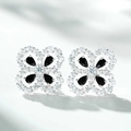 Detailed view of silver flower earrings featuring black pear-cut stones and white zircons - 925 Silver / Black (ED006)