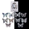 Adesivi farfalla in PET Lace Overture con effetto laser su sfondi bianco e nero - Farfalle Nei Sogni