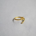 Detail of adjustable gold ring featuring an initial N letter and a sparkling zircon stone - Alphabet Style N