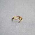 Detail of adjustable gold ring featuring a letter P and a round sparkling zircon stone - Alphabet Style P