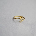 Close-up of golden initial R open ring with micro-set round zircon stone detail - Alphabet Style R