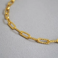 Collana a catena in ottone dorato con maglie ovali e design con finitura martellata - Oro Texturizzato