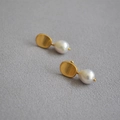 Retro brass matte gold baroque freshwater pearl stud earrings on a textured grey surface - Freshwater Pearl Studs