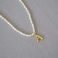 Elegant freshwater pearl necklace with a gold bamboo-textured letter A pendant charm - Letter A