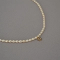 Collana vintage di perle d'acqua dolce con ciondolo occhio del male dorato e spinello blu - Ciondolo Occhio del Diavolo