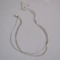 Collana doppia a strati in argento con catena a serpente e maglia sottile - Argento