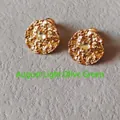 Detailed macro shot of textured gold stud earrings with August light peridot stones - 1.5cm-August Light Peridot