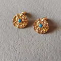 Detail of gold hammered earrings with December turquoise stone in a round setting - 1.5cm-December Turquoise