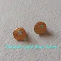 Detail of gold textured stud earrings with light blue-green gemstone for October - 1cm-October Light Blue-Green