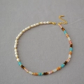 Detail of asymmetric necklace featuring freshwater pearls and colorful gemstones - Necklace 2