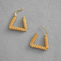 Detailed macro view of gold triangular hoop earrings with intricate woven texture finish - Gold Triangle Granulated Texture Hook Earrings (6)