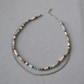 Double-layered beaded necklace with colorful round stones and adjustable metal chain link - Double Layer