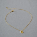 Collana minimalista in ottone stile francese con ciondoli bicolore oro e argento - Contrasto Oro e Argento