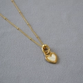 Elegant gold heart pendant necklace with white mother of pearl inlay and bead chain - Black+White