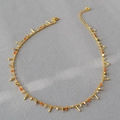 Bohemian gold chain necklace with colorful beads and metal fringe on grey fabric - Orange White Blue Beads (Style 2)