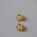 Gold hoop earrings with removable colorful zircon charms on a textured gray background - Gold Multicolor Rhinestone Style